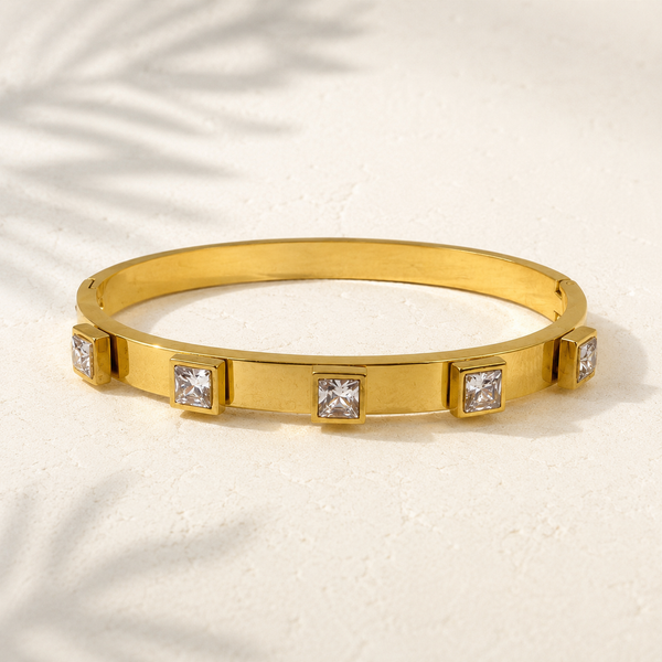 Gold Evenly Spaced Square Solitaire Diamond Oval Kada for Women | Channel Set Single Stone Stainless Steel Ladies Bangle | Premium Festive Jewellery - House of Viya