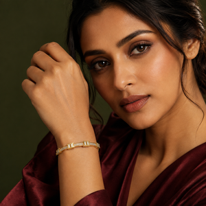 Kadas Gold-Tone Geometric Engraved Pattern Bangle with Polished Finish for Women