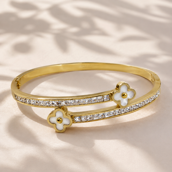 Gold Scattered Diamond Station Oval Kada for Women | Prong Set Floating Stone Stainless Steel Ladies Bangle | Modern Festive Jewellery