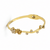 Kadas Gold-Tone Openable Floral Motif Kada with Crystal-Studded Flower Accent - Polished Finish Bypass Cuff Bracelet