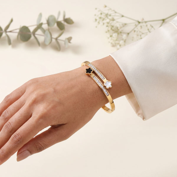Mother of pearl floral gold plated baby kada bangle on wrist – House of Viya lifestyle shot