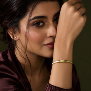 Kadas Gold-Tone Baguette Solitaire Stone-Studded Kada with Crystal Shoulder Accents - Polished Finish Slim Bracelet