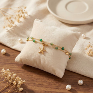 Anti-Tarnish Gold Plated 2-Layer Green Beads Bracelet with starfish charm by House of Viya on cushion