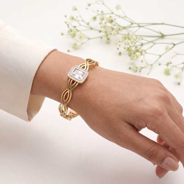 Woman wearing Square CZ Halo Watch Style Gold Baby Kada Bangle - Infinity Link Statement Bracelet | House of Viya