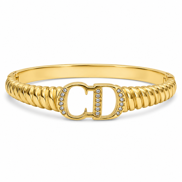 Gold CD Logo Initials Ribbed Twisted Band Oval Kada for Women | Monogram Designer Stainless Steel Ladies Bangle | Luxury Brand Festive Jewellery - House of Viya
