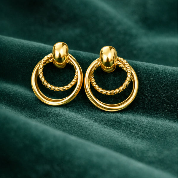 Anti-Tarnish Gold Plated Hanging 2 Spiral and 1 Plain Loop Earrings by House of Viya on green fabric background