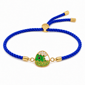 18K Gold Plated Rakhi Stone-Studded Dinosaur Egg Motif Kids Rakhi - House of Viya