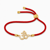 18K Gold Plated Rakhi Stone-Studded Om CZ Motif Religious Rakhi