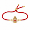 18K Gold Plated Rakhi Stone-Studded Kalash Motif Religious Traditional Rakhi