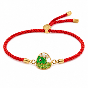 18K Gold Plated Rakhi Stone-Studded Dinosaur Egg Motif Kids Rakhi - House of Viya
