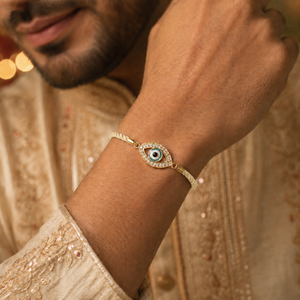 18K Gold Plated Rakhi Stone-Studded Eye Design Motif Charm Rakhi - House of Viya