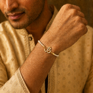18K Gold Plated Rakhi Stone-Studded Om CZ Motif Religious Rakhi - House of Viya