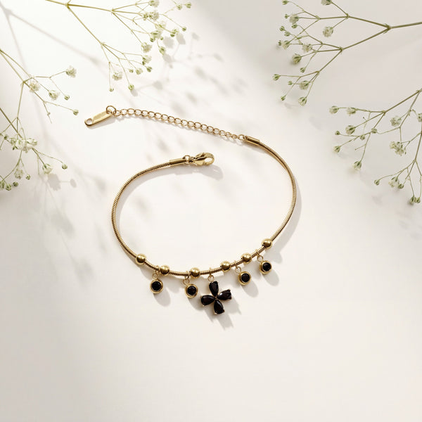 Gold Plated Snake Chain Bracelet with Black Clover and Black Stone Charm Cluster