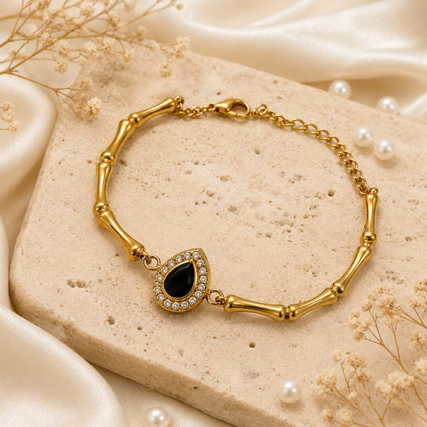 Gold Plated Bamboo Bar Link Bracelet with Oval Black Stone Halo Centrepiece and Lobster Clasp - House of Viya