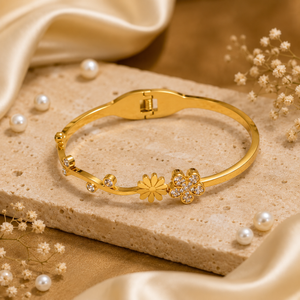 Kadas Gold-Tone Openable Floral Motif Kada with Crystal-Studded Flower Accent - Polished Finish Bypass Cuff Bracelet