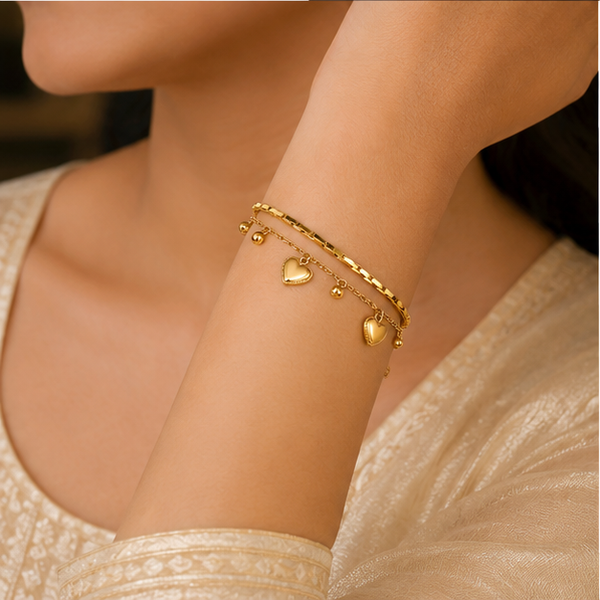 Gold Plated Double Strand Layered Chain Bracelet with Dangling Heart Charms and Bead Drops - House of Viya