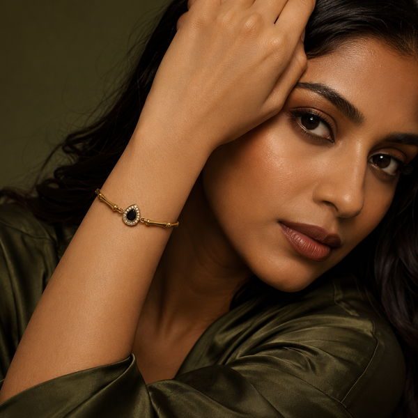 Gold Plated Bamboo Bar Link Bracelet with Oval Black Stone Halo Centrepiece and Lobster Clasp - House of Viya